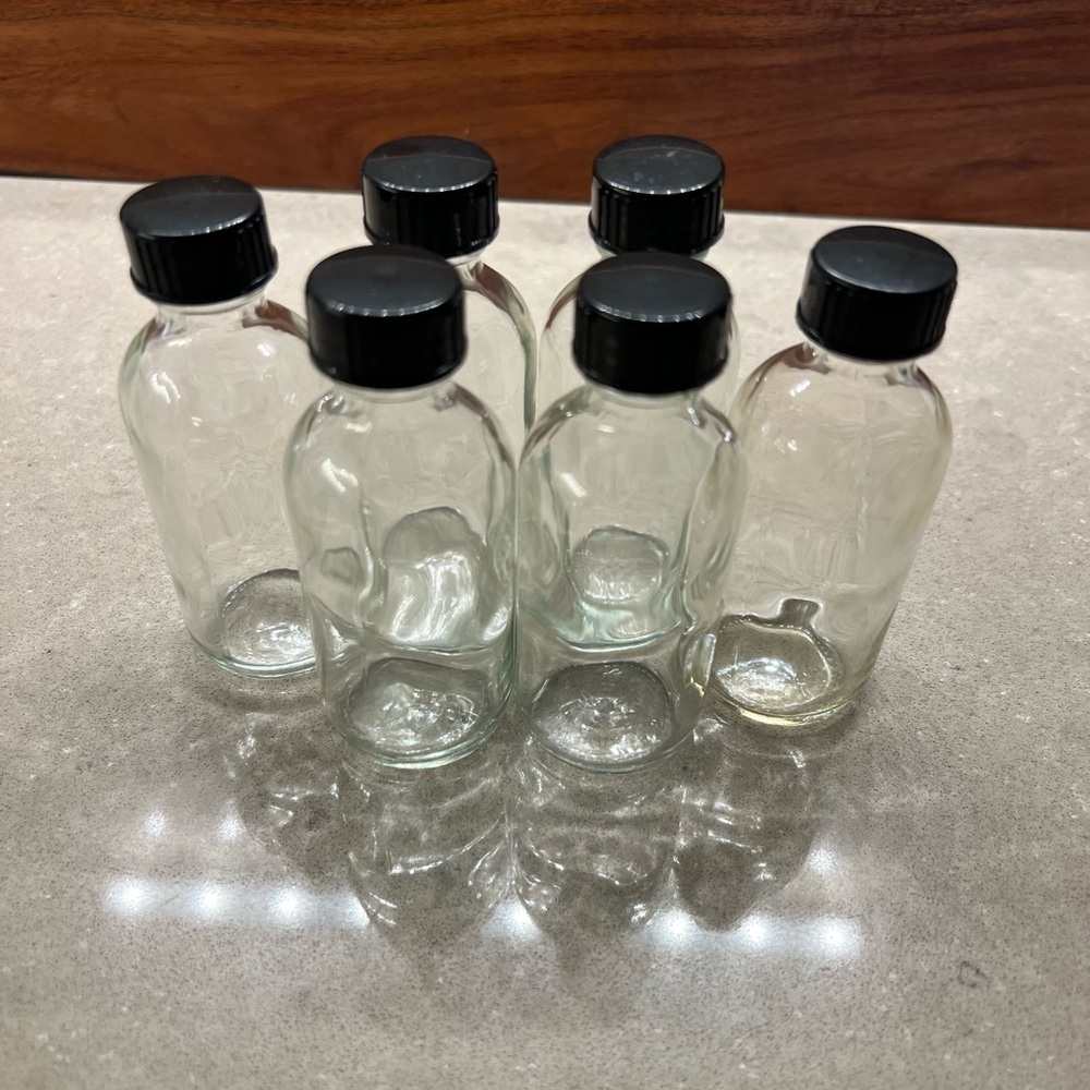 Six 2 oz Glass Bottles